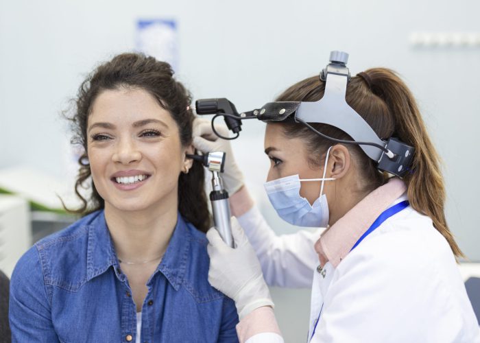 hearing-exam-otolaryngologist-doctor-checking-woman-s-ear-using-otoscope-auriscope-medical-clinic (1)